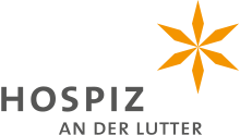 . Logo von Hospiz an der Lutter mit einem sechszackigen, orangen Stern.